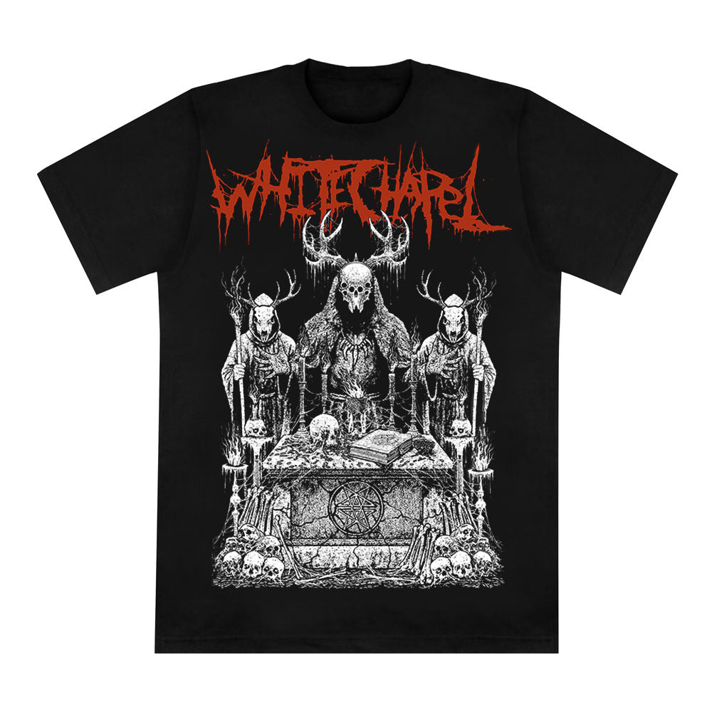 Whitechapel Black Comfort Colors T-shirt with jagged red Whitechapel logo above a detailed white print of skeletal, horned figures by an altar surrounded by skulls and bones. Limited presale—secure your printed garment now!.